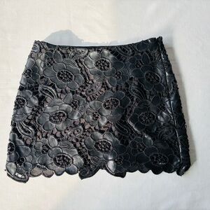 Forever 21 faux leather skirt with a floral crochet overlay